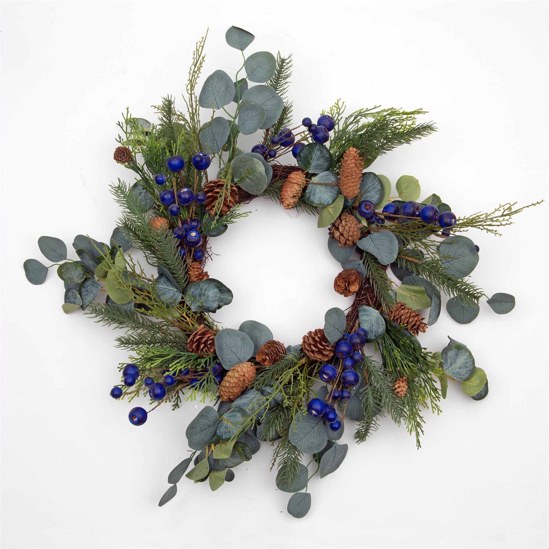 Natural Looking Wreath Decorated With Black Berries And Leaves